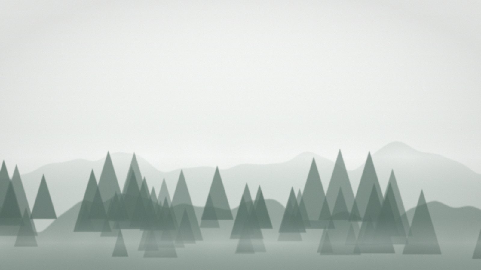 Pine ridge disappearing into fog